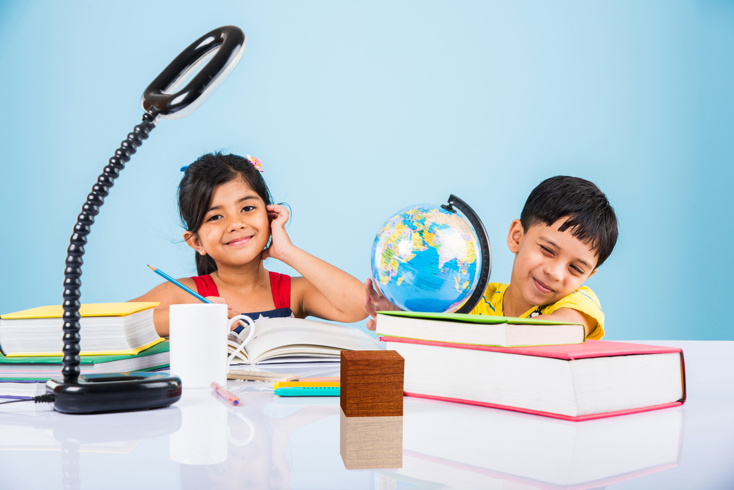 indian kids studying on study table